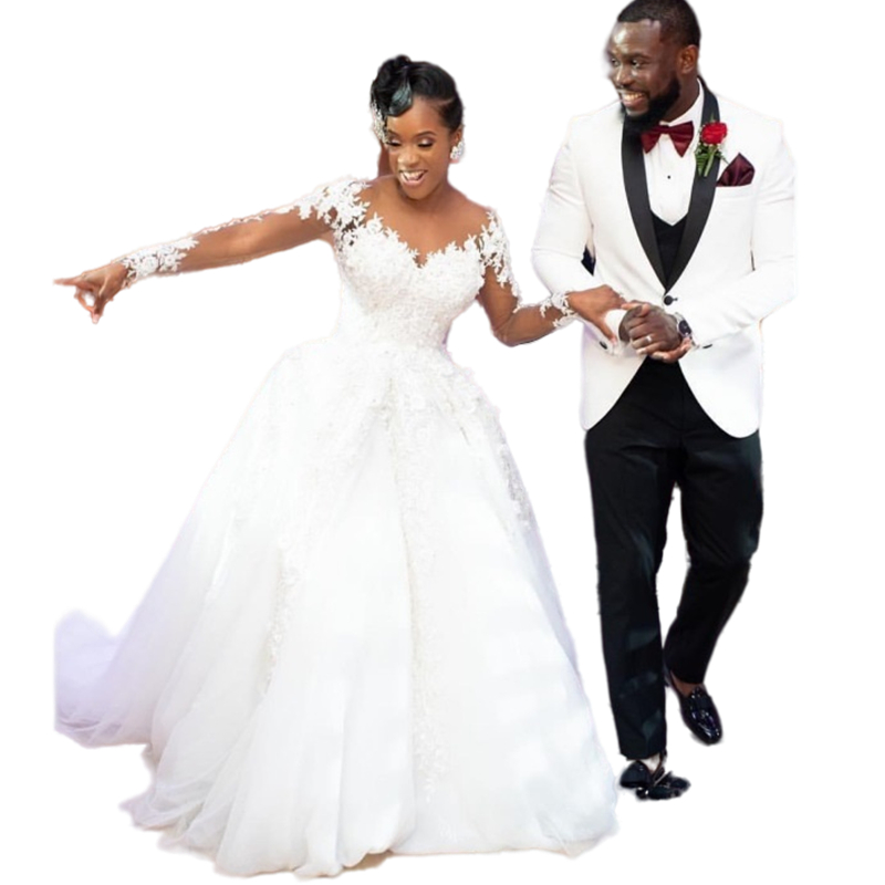 Luxury African Ivory Floral Lace A Line Wedding Dress Appliques Long Sleeve Sexy Backless Chapel Train Bridal Gowns Sheer Illusion Black Girl Wedding 