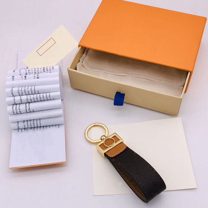 Fashion Luxury Designer Cute Men Women Fashion Bag Hanging Buckle Keychains Waist Key Chain Handmade Leather Holder Lover Keychain 2021
Fashion Luxury Designer Cute Men Women Fashion Bag Hanging Buckle Keychains Waist Key Chain Handmade Leather Holder Lover Keychain 2021