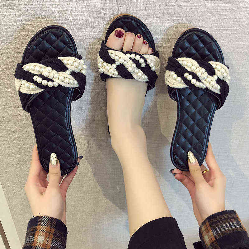 New Korean version with one word open toe sandals women's summer fashion flat bottom woven pearl sandals, Black
New Korean version with one word open toe sandals women's summer fashion flat bottom woven pearl sandals, Black