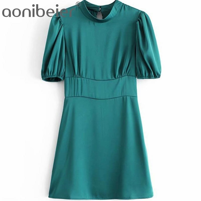 Green Satin Mini Dress Summer Half High Collar Puff Sleeve Keyhole Back Women Casual Waist Female Sundress 210604
Green Satin Mini Dress Summer Half High Collar Puff Sleeve Keyhole Back Women Casual Waist Female Sundress 210604