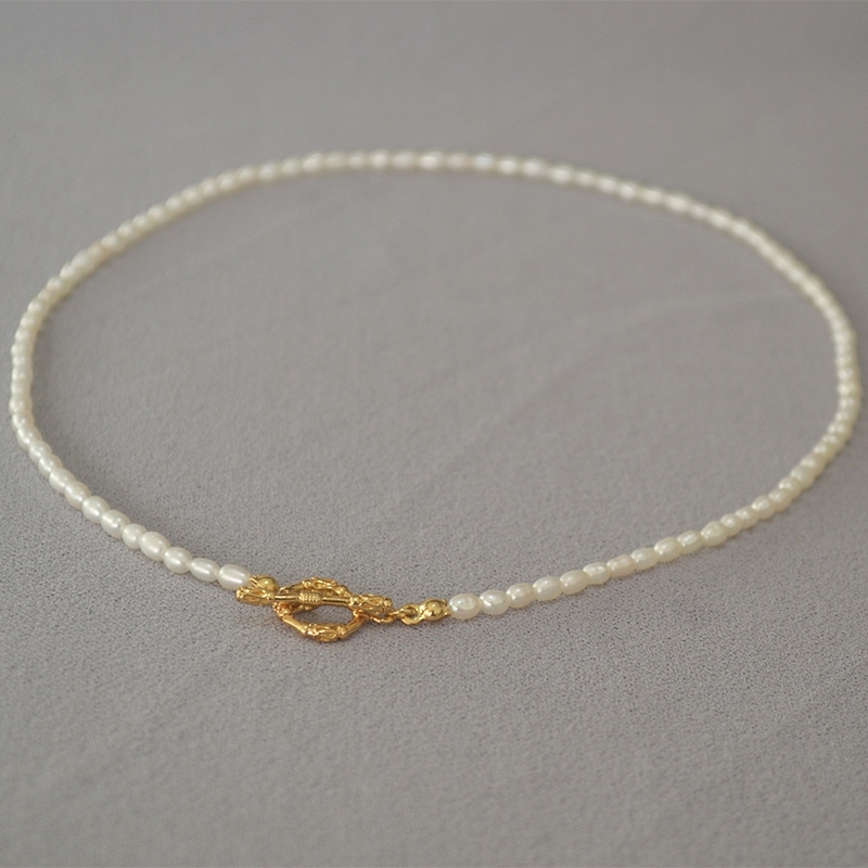 French aestheticism water rice grain small pearl retro vine flower branch ot button simple short temperament Necklace clavicle
French aestheticism water rice grain small pearl retro vine flower branch ot button simple short temperament Necklace clavicle