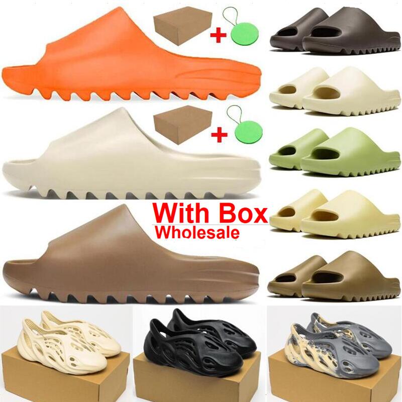 Slippers Foam Runner Slide Bone Ochre Sand Mineral Blue MX Cream Clay MXT Moon Grey White Men Women Indoor shoes Enflame Orange Core Wholesale With Box, Color-1
Slippers Foam Runner Slide Bone Ochre Sand Mineral Blue MX Cream Clay MXT Moon Grey White Men Women Indoor shoes Enflame Orange Core Wholesale With Box, Color-1