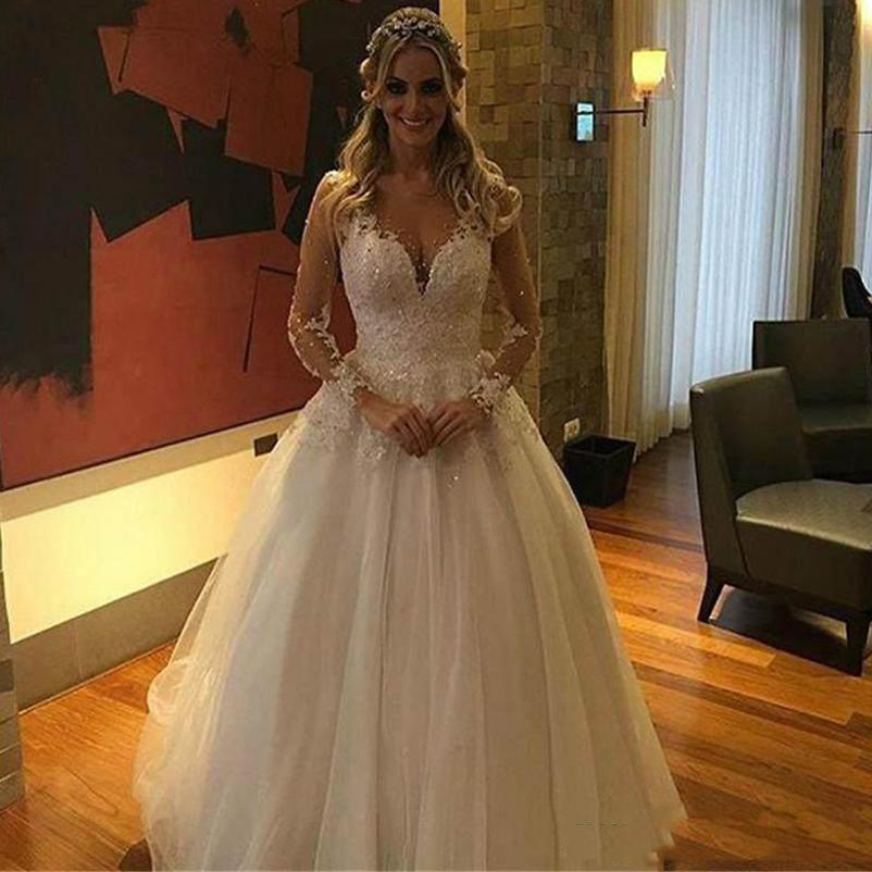 Long Sleeves Lace Wedding Dresses with Beaded Appliques Jewel Neck Sweep Train Tulle A Line Wedding Bridal Gowns, White
Long Sleeves Lace Wedding Dresses with Beaded Appliques Jewel Neck Sweep Train Tulle A Line Wedding Bridal Gowns, White