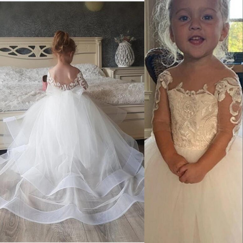 Cute Floer Girls Dresses White Lace Appliques Tulle Jeel Neck Long Sleeves Seep Train Birthday Communion Children Girl Pageant Gons Open Back Tiered