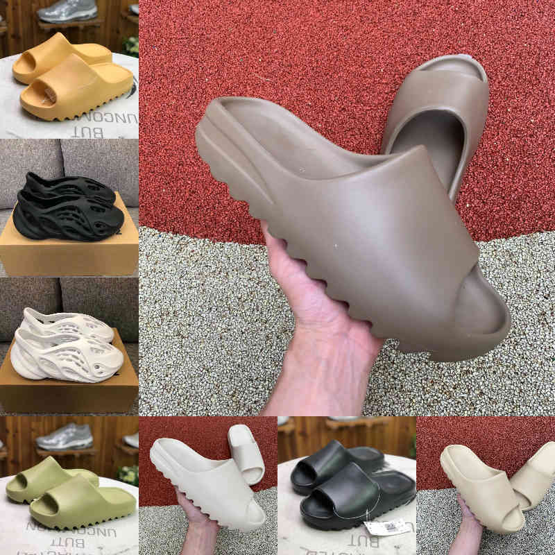 Wholesale 2021 New Kanyes Wests Slipper Men Women Slide Bone Earth Brown Desert Sand Slide Resin Fashion Shoes Sandals Foam Runner Trainers Size 36-45 F09, G209 
Wholesale 2021 New Kanyes Wests Slipper Men Women Slide Bone Earth Brown Desert Sand Slide Resin Fashion Shoes Sandals Foam Runner Trainers Size 36-45 F09, G209