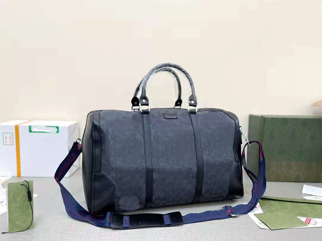 Brand Classic designer 45 CM Women Travel Bag Men Duffle Bags Rolling Softsided Suitcase Hand Luggage Set Unisex Handbag Tote
Brand Classic designer 45 CM Women Travel Bag Men Duffle Bags Rolling Softsided Suitcase Hand Luggage Set Unisex Handbag Tote