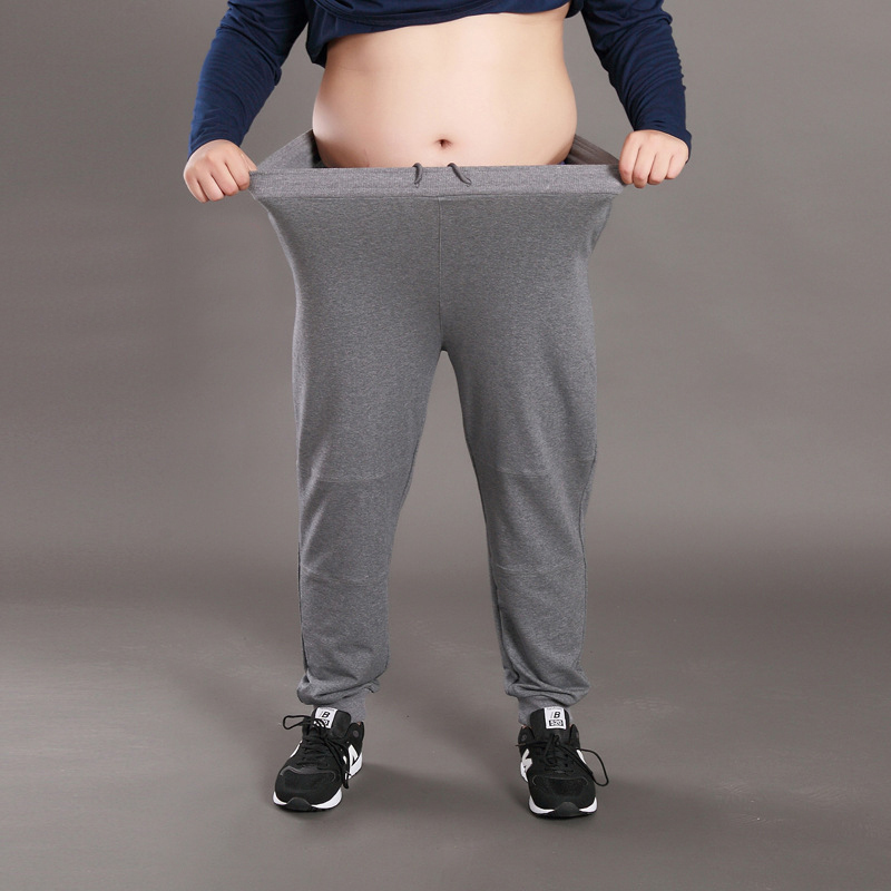 Men Big Size Solid Sweatpants Spring Elastic Narrow Feet Stretch Pants Loose Plus Size Casual Cotton Jogger Trousers 5XL 6XL 7XL 201118