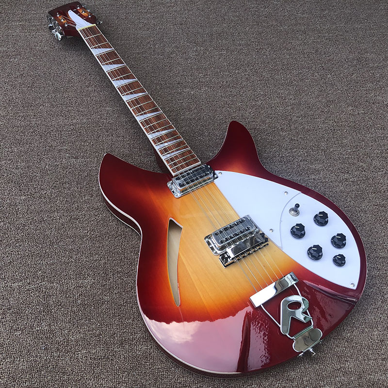 Fire Glo Vintage Sunburst 360 330 12 Strings Electric Guitar Dual Input Jacks, Laquer Gloss Fingerboard, Triangle Inlay, R Tailpiece, Sandwich Neck, Sharp Corner
Fire Glo Vintage Sunburst 360 330 12 Strings Electric Guitar Dual Input Jacks, Laquer Gloss Fingerboard, Triangle Inlay, R Tailpiece, Sandwich Neck, Sharp Corner