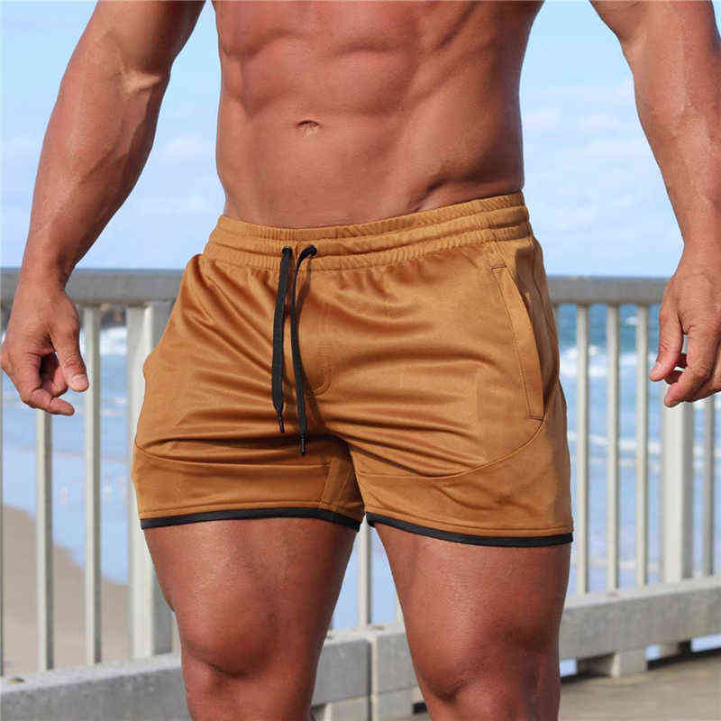 2019 New summer Men Sporting Beaching Shorts Fashion Bodybuilding Sweatpants Fitness Short Jogger Casual Gyms Men Shorts Y220217