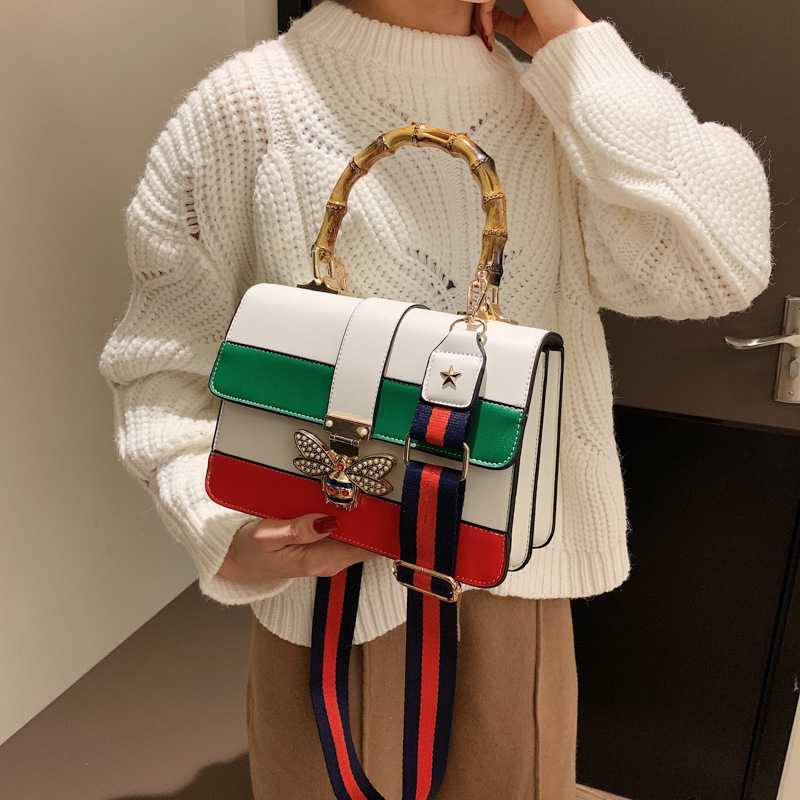 woman bee hit color stitching Replica shoulder bag female messenger bag fashion handbag female wide shoulder strap small bags
woman bee hit color stitching Replica shoulder bag female messenger bag fashion handbag female wide shoulder strap small bags