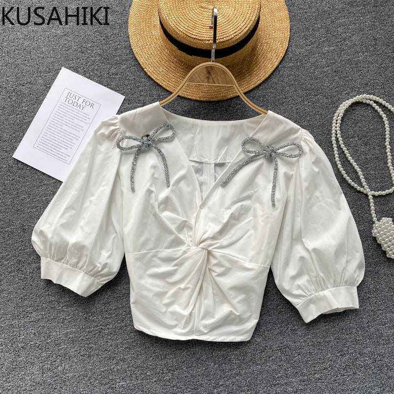 KUSAHIKI Short Womens Tops Korean Diamonds Bowknot Shirt Twisted V-neck Puff Sleeve Blouse Summer Top Blusas 6G937 210602, White
KUSAHIKI Short Womens Tops Korean Diamonds Bowknot Shirt Twisted V-neck Puff Sleeve Blouse Summer Top Blusas 6G937 210602, White