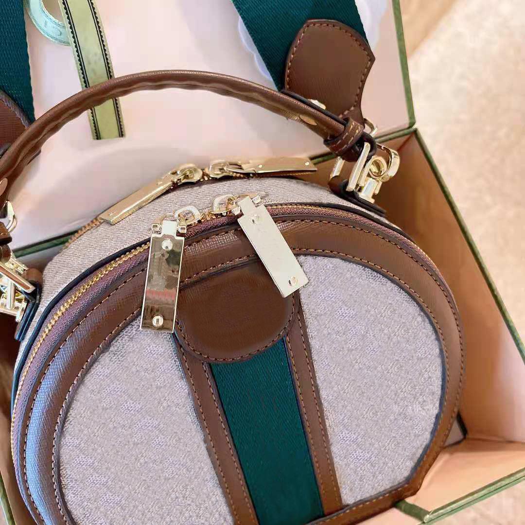 Designer luxury ladies shoulder bag brown round messenger brand leather handbag small with original box retail and wholesale, No bag
Designer luxury ladies shoulder bag brown round messenger brand leather handbag small with original box retail and wholesale, No bag