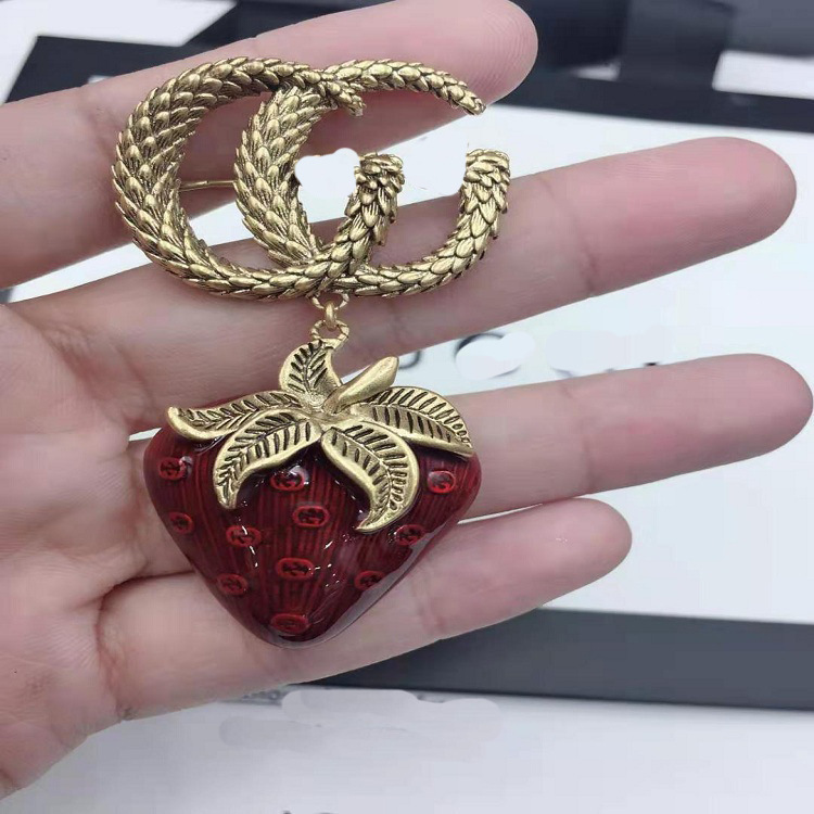 Gujia 2021 new strawberry double g female fashion simple temperament personality Brooch
Gujia 2021 new strawberry double g female fashion simple temperament personality Brooch