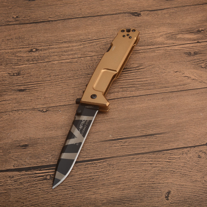High Quality Nemesis Tactical folding knife 440C Titanium Coated Blade Gold 6061-T6 Handle Survival Pocket Knives With Retail Box
High Quality Nemesis Tactical folding knife 440C Titanium Coated Blade Gold 6061-T6 Handle Survival Pocket Knives With Retail Box