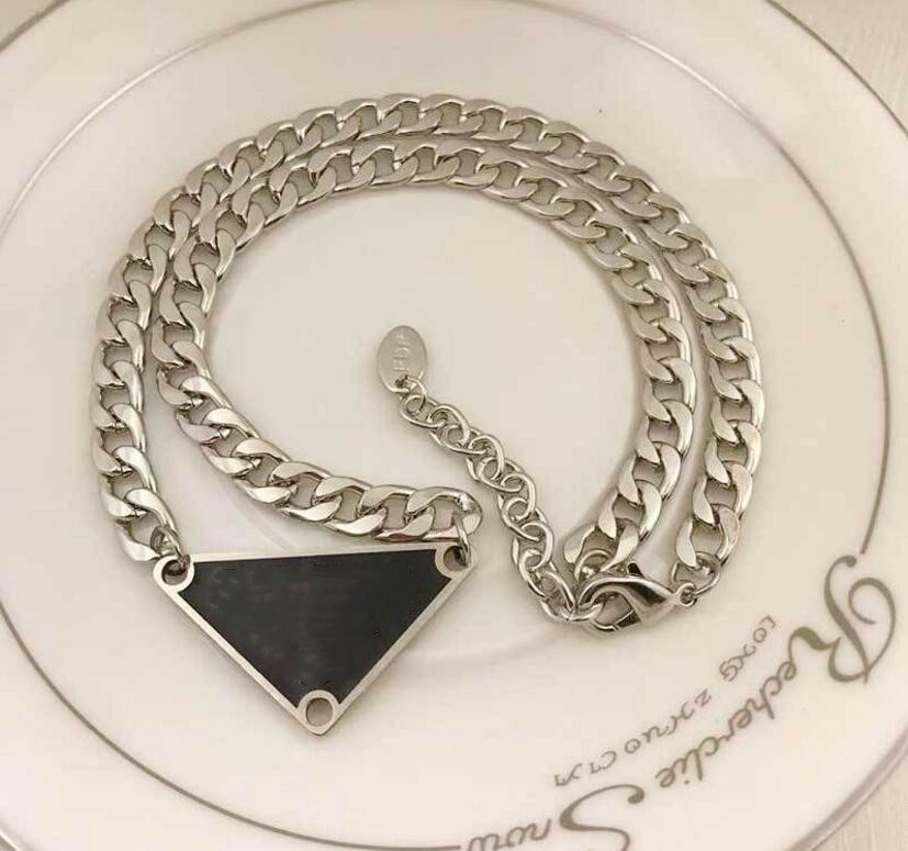 European and American triangle titanium steel letter necklace fashion street hip hop personality simple clavicle chain female high quality fast delivery
European and American triangle titanium steel letter necklace fashion street hip hop personality simple clavicle chain female high quality fast delivery