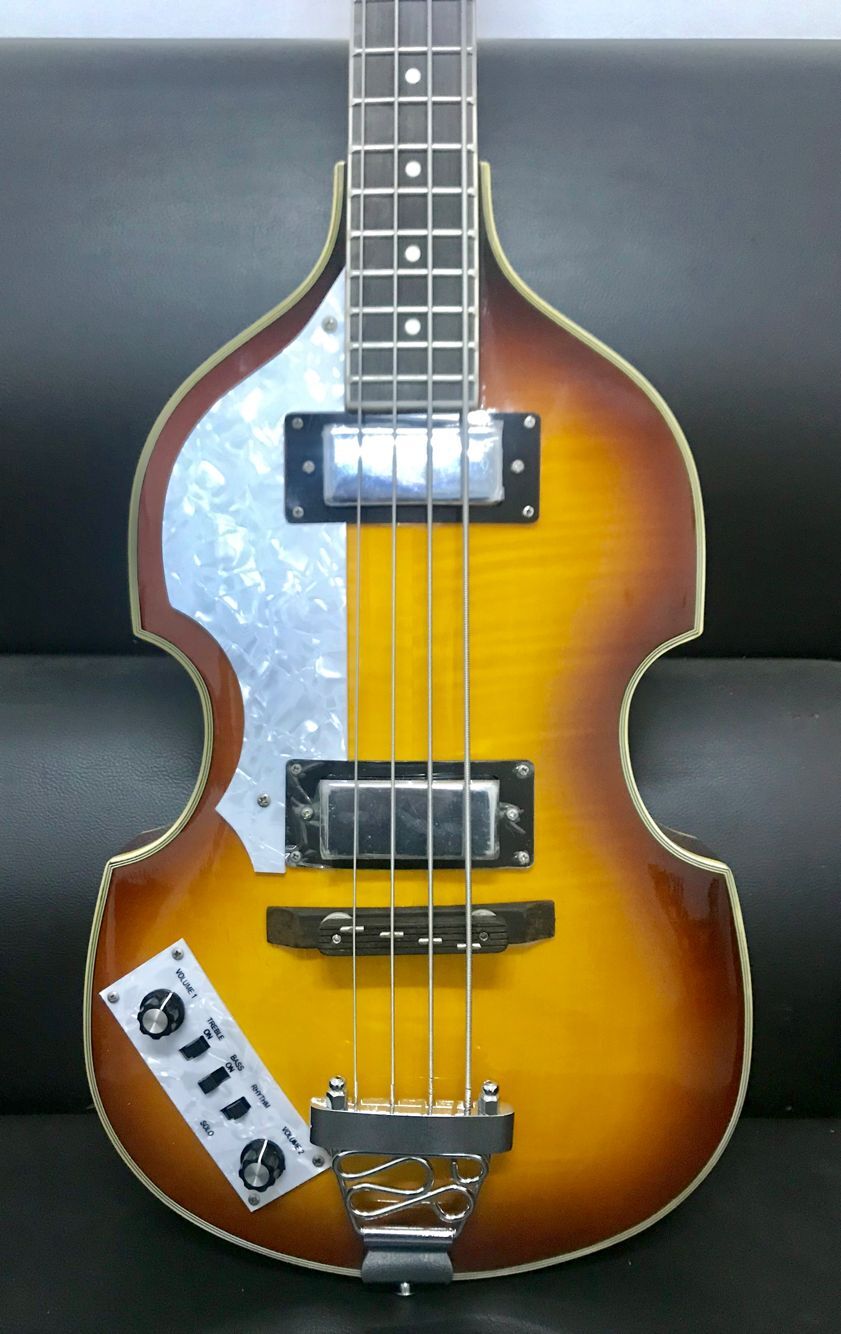 Hofner Deluxe Vintage Sunburst 4 Strings Violin Bass Electric Guitar Flame Maple Top & Back, 2 511B Staple Pickups, H500/1-CT Contemporary, White Tuners, Pearl Pickguard
Hofner Deluxe Vintage Sunburst 4 Strings Violin Bass Electric Guitar Flame Maple Top & Back, 2 511B Staple Pickups, H500/1-CT Contemporary, White Tuners, Pearl Pickguard