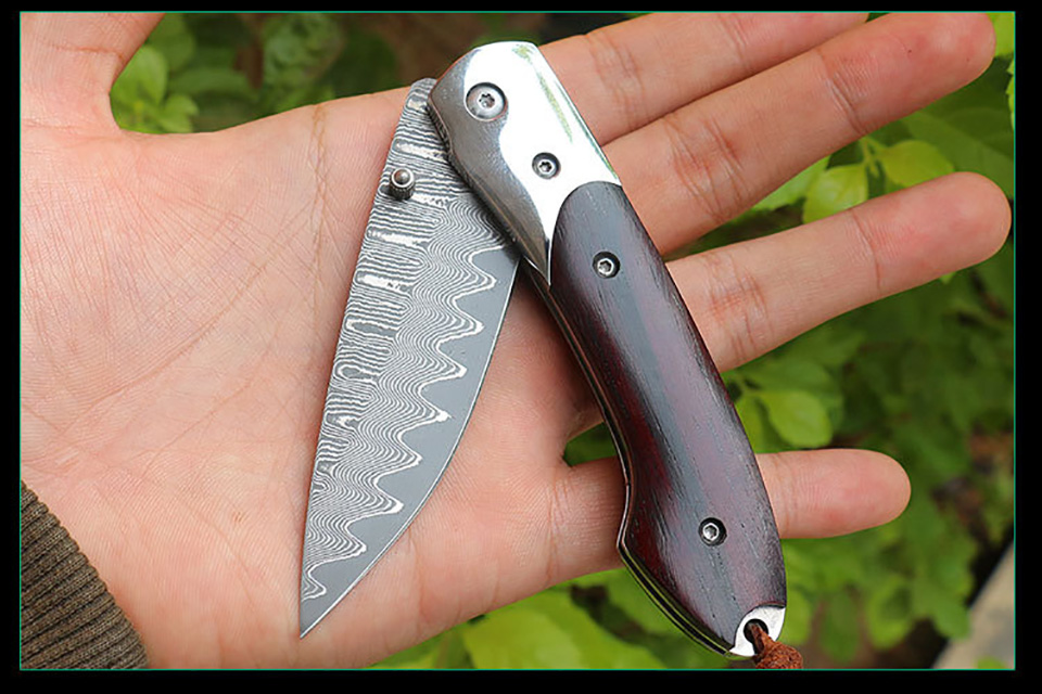 great quality rosewood handle damascus sharp blade linerlock tactical knife with great leather case outdoor hiking tool knives messer edc
great quality rosewood handle damascus sharp blade linerlock tactical knife with great leather case outdoor hiking tool knives messer edc