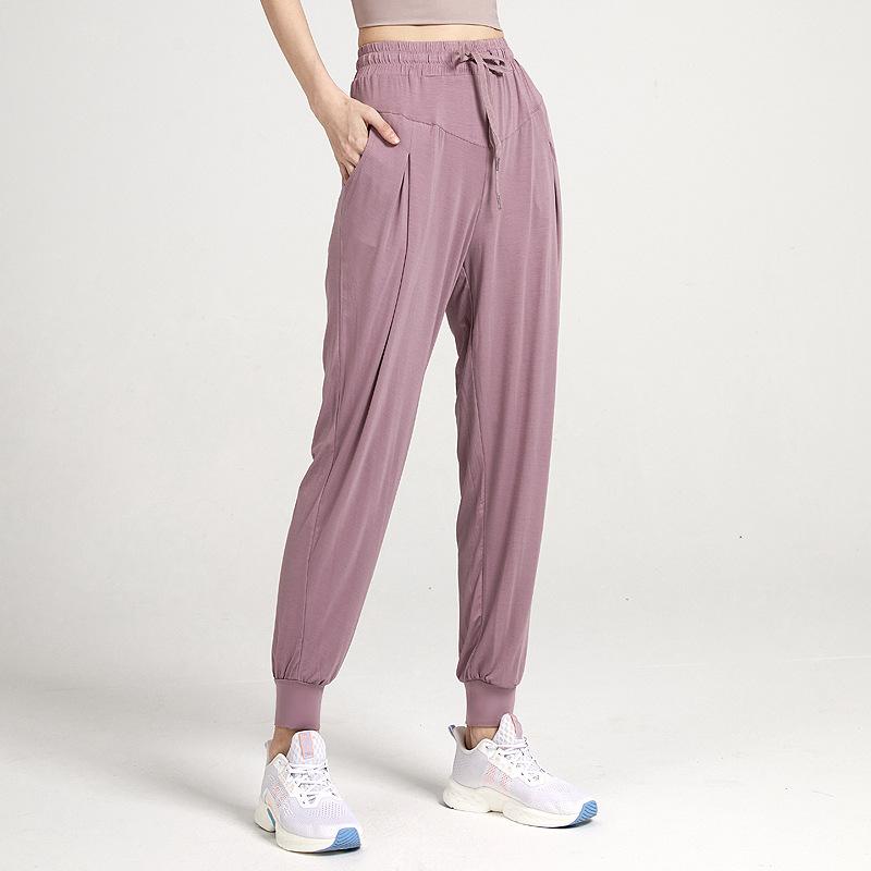 Women Sport Trousers Breathable Sports Pants Ladies Yoga Running Fitness Pants Casual Solid Color Loose Foot Straps Female 2021
Women Sport Trousers Breathable Sports Pants Ladies Yoga Running Fitness Pants Casual Solid Color Loose Foot Straps Female 2021
