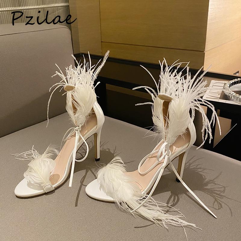 Pzilae New Sexy White Black Feather Sandals For Women Thin High Heels Lace Up Dance Shoes ladies Sandals Party Pumps Size 35-42
Pzilae New Sexy White Black Feather Sandals For Women Thin High Heels Lace Up Dance Shoes ladies Sandals Party Pumps Size 35-42