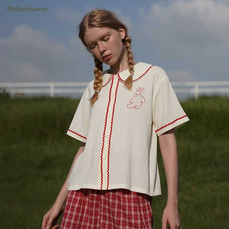 High Quality Vintage Cotton White Shirt Top Sweet Lace Embroidery Bunny Women Summer Blouse Peter Pan Collar Casual Loose Tops 210721
High Quality Vintage Cotton White Shirt Top Sweet Lace Embroidery Bunny Women Summer Blouse Peter Pan Collar Casual Loose Tops 210721