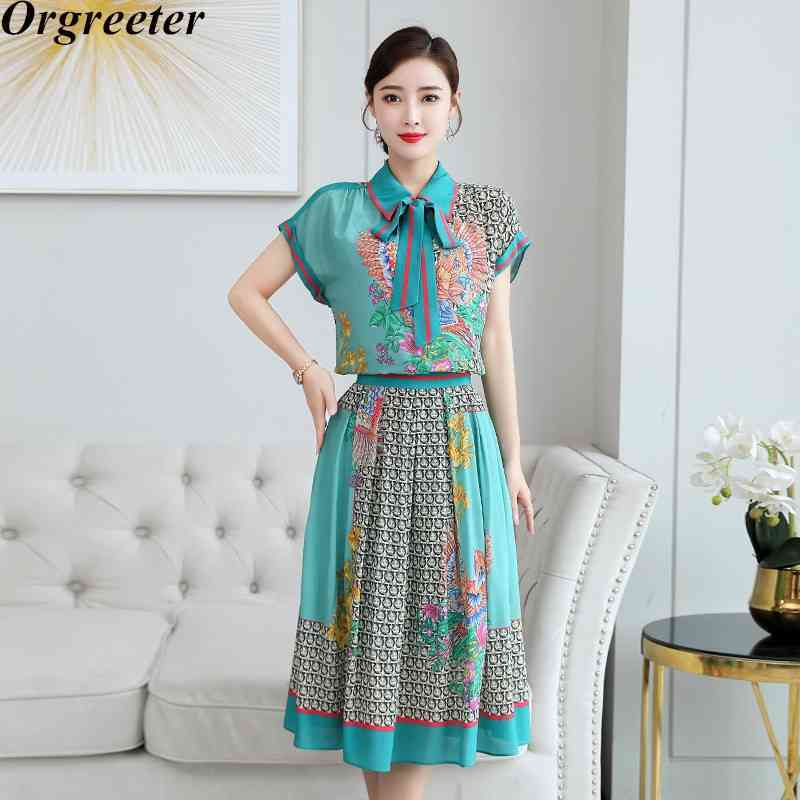Runway Design Peacock Prin 2 Piece Set Women Lapel Short Sleeve Lace-up Bow Blouse Tops +Elastic Waist Knee-length Skirts Suits 210525, Green
Runway Design Peacock Prin 2 Piece Set Women Lapel Short Sleeve Lace-up Bow Blouse Tops +Elastic Waist Knee-length Skirts Suits 210525, Green