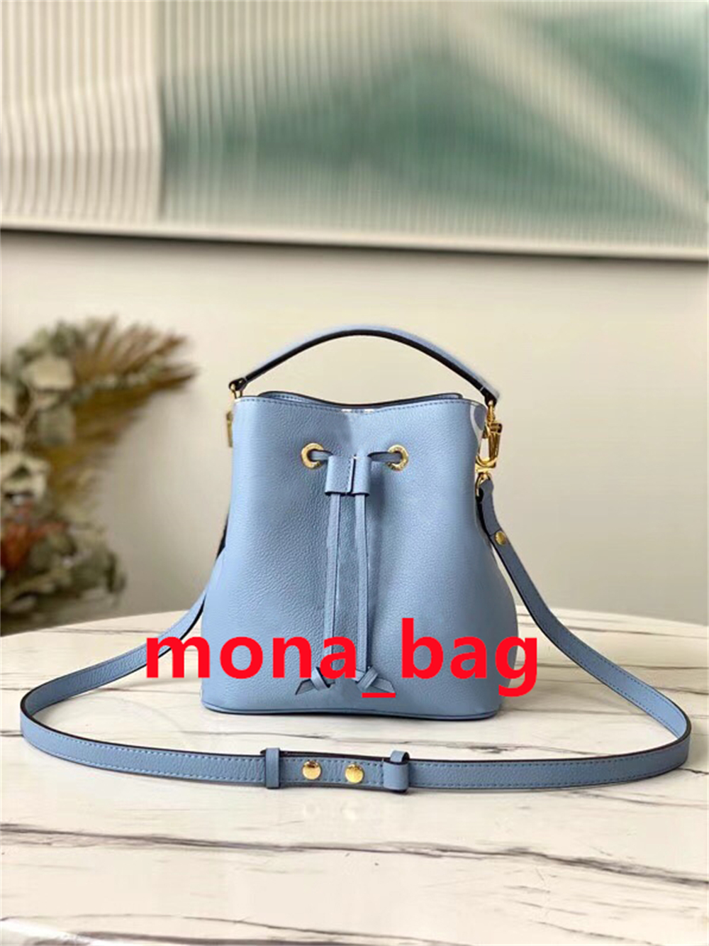 Designer Bucket Shoulder bag Classic Style high quality lady Genuine leather bags luxurys designers 2 colors Sky Blue Beige mona-bag European and American styles
Designer Bucket Shoulder bag Classic Style high quality lady Genuine leather bags luxurys designers 2 colors Sky Blue Beige mona-bag European and American styles