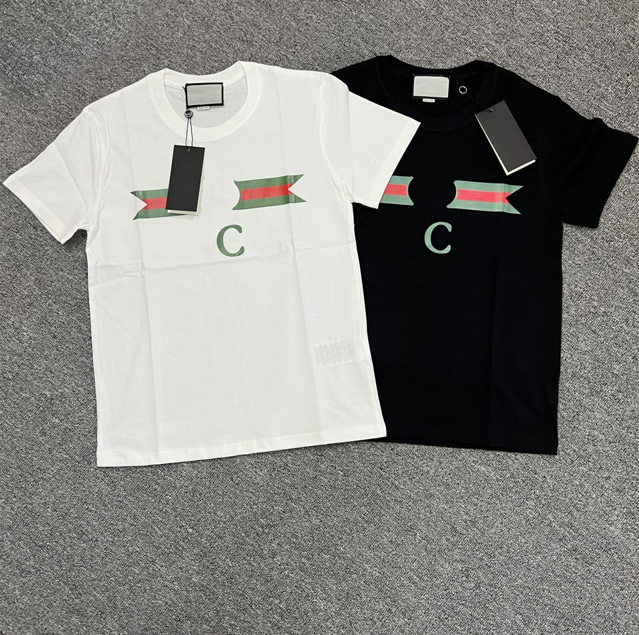 Luxury brand new short-sleeved T-shirt printing top casual fashion clothing men and women with the same paragraph, White;black
Luxury brand new short-sleeved T-shirt printing top casual fashion clothing men and women with the same paragraph, White;black