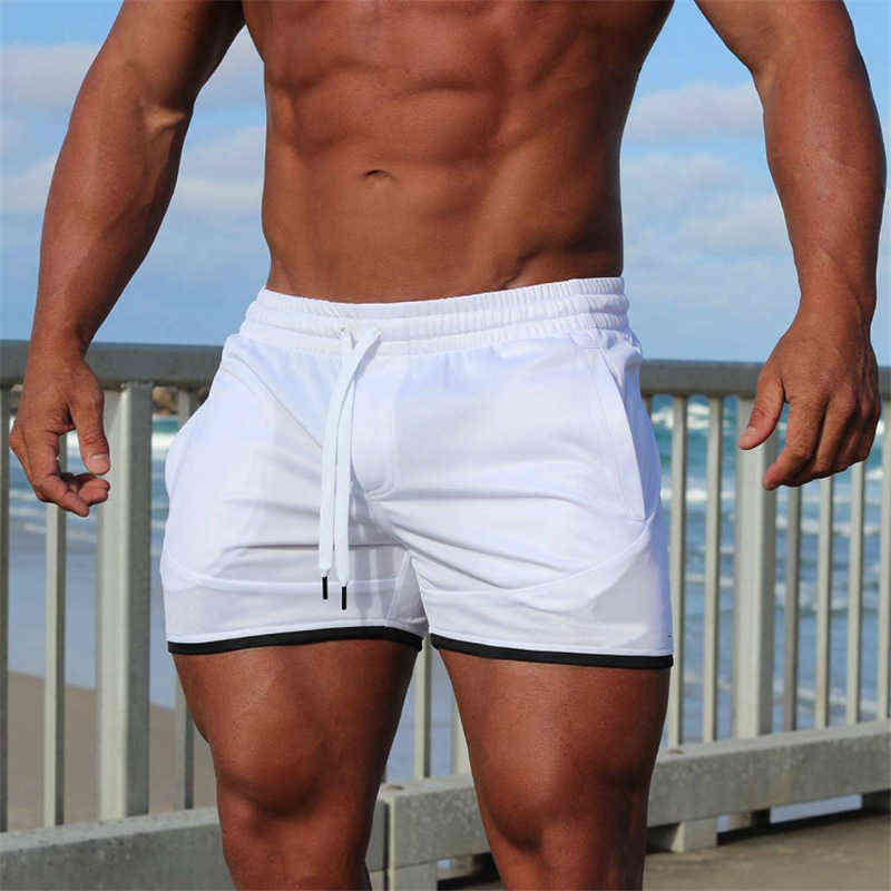 2019 New summer Men Sporting Beaching Shorts Fashion Bodybuilding Sweatpants Fitness Short Jogger Casual Gyms Men Shorts Y220217