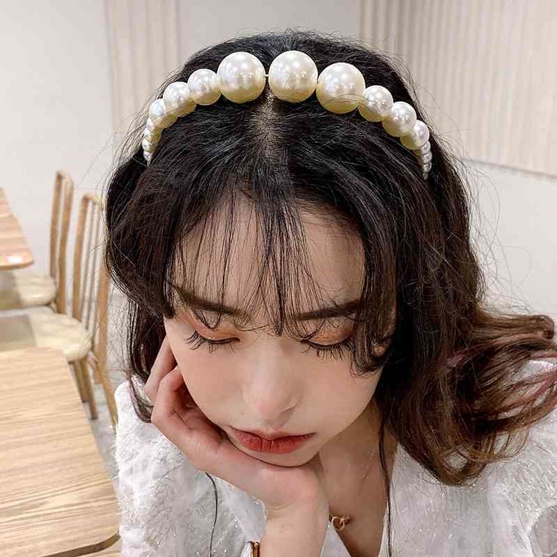 simple imitation band Women's fashion versatile pearl headband hair button accessories
simple imitation band Women's fashion versatile pearl headband hair button accessories