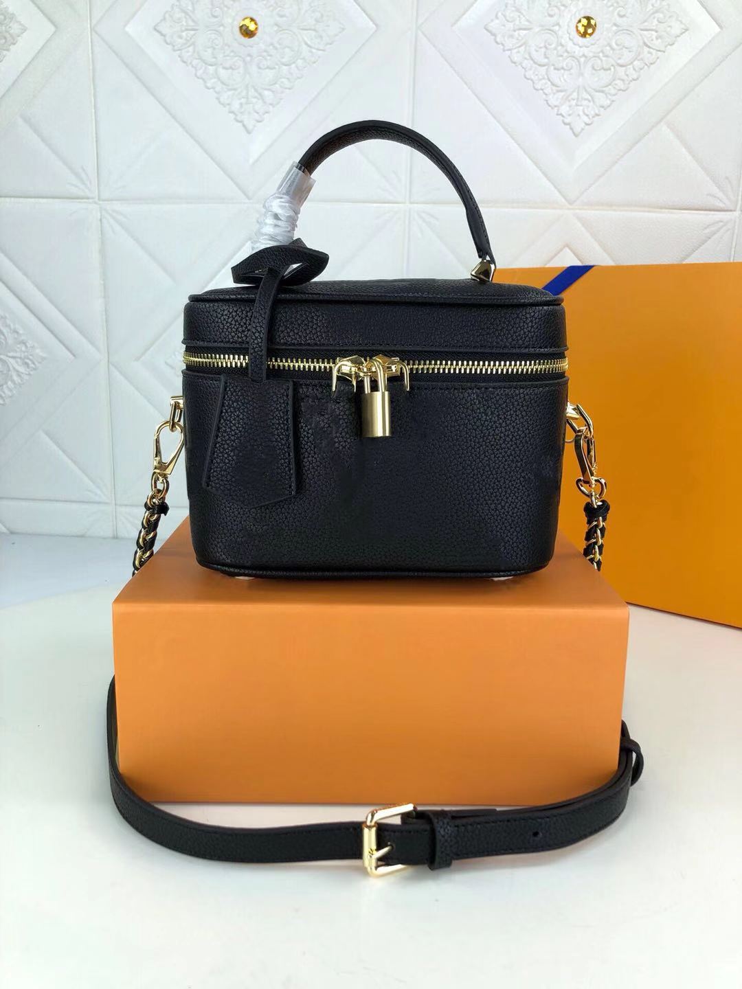 Fashion Empreinte Leather Giant Flower Women Mini Vanity Cases Travel Crossbody bag Embossed grain leather zipper open leather braided chain, Black
Fashion Empreinte Leather Giant Flower Women Mini Vanity Cases Travel Crossbody bag Embossed grain leather zipper open leather braided chain, Black