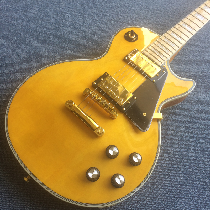 High Quality Transparent yellow Electric Guitar,Mahogany body and neck,Maple fingerboard,Gold hardware181102
High Quality Transparent yellow Electric Guitar,Mahogany body and neck,Maple fingerboard,Gold hardware181102