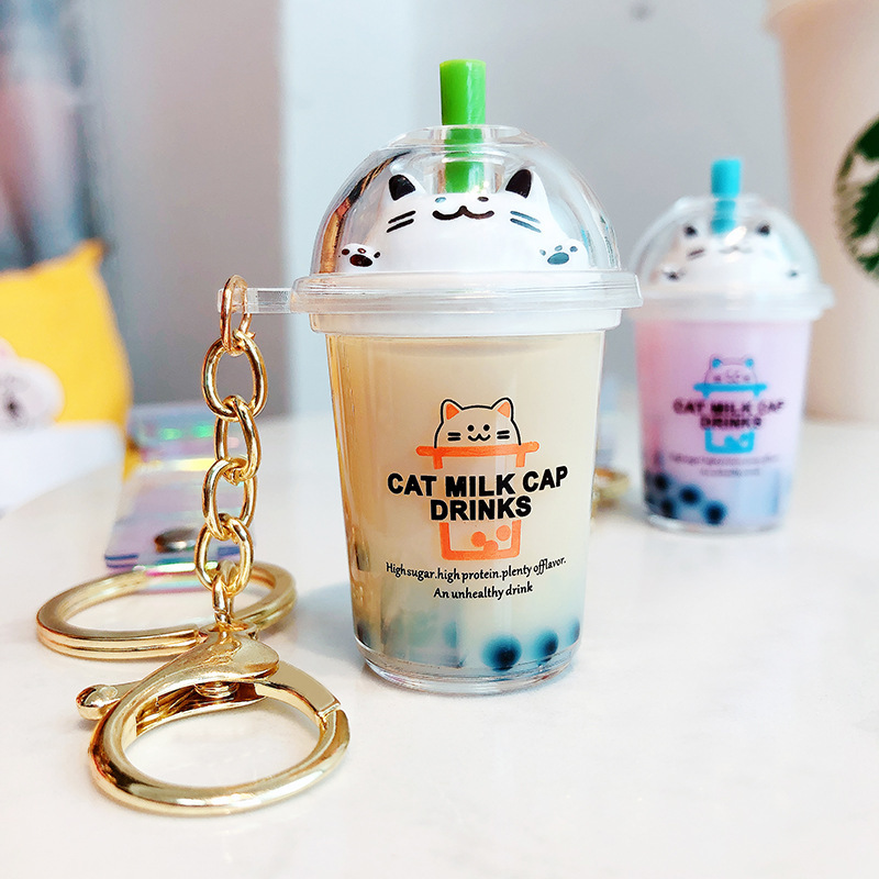 New Keychain Cartoon Cat Car Keychain Mini Milk Tea Cup Liquid Crystal Quicksand Sequin Key Ring Bag Pendant for Women Y0306
New Keychain Cartoon Cat Car Keychain Mini Milk Tea Cup Liquid Crystal Quicksand Sequin Key Ring Bag Pendant for Women Y0306