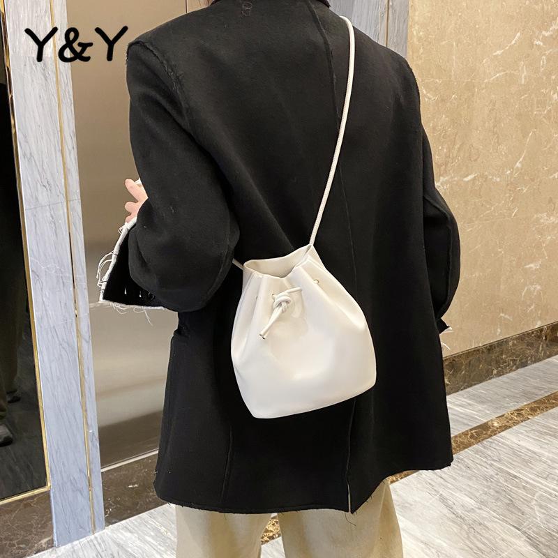 Y&Y French Niche Bag Female Fashion One shoulder Women PU String Messenger Bag Simple and Versatile Bucket Casual Retro Bags, Black
Y&Y French Niche Bag Female Fashion One shoulder Women PU String Messenger Bag Simple and Versatile Bucket Casual Retro Bags, Black