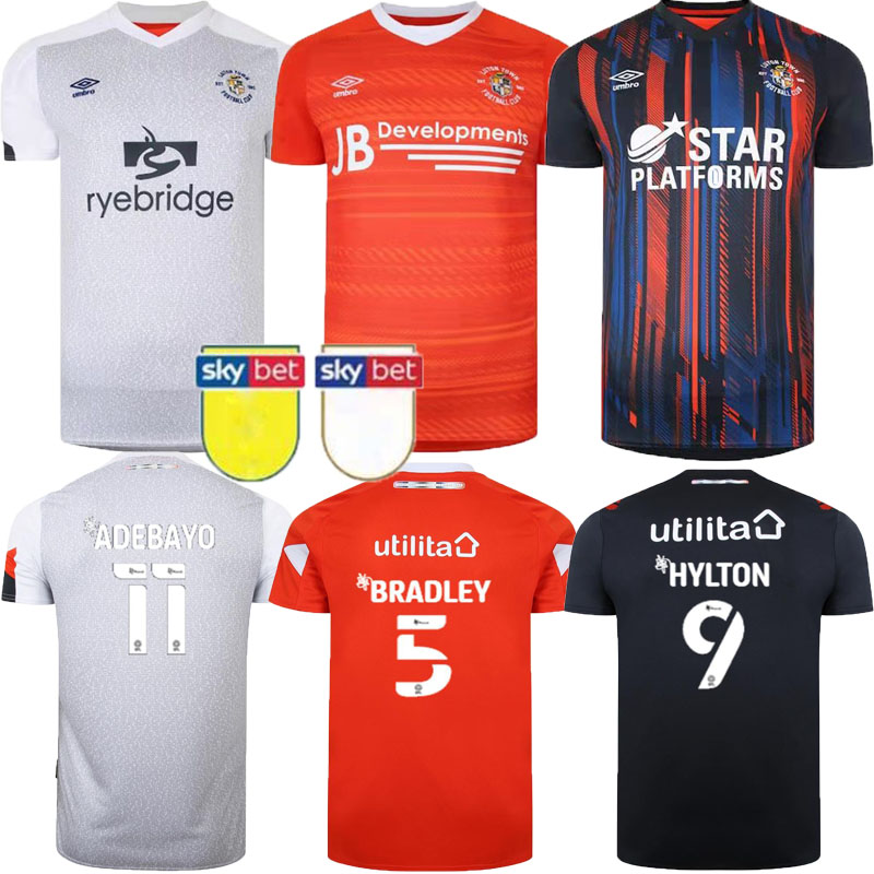 Luton Town Football Jersey 21/22 9 HYLTON Home Red Soccer 11 ADEBAYO Away Shirt 2021/2022 Men #5 BRADLEY 3rd Uniforms camiseta de fUtbol, Black;red
Luton Town Football Jersey 21/22 9 HYLTON Home Red Soccer 11 ADEBAYO Away Shirt 2021/2022 Men #5 BRADLEY 3rd Uniforms camiseta de fUtbol, Black;red