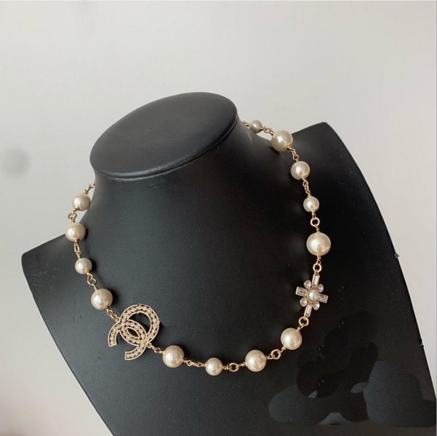 European and American fashion new cross diamond pearl letter necklace female clavicle chain sweater chain, Silver
European and American fashion new cross diamond pearl letter necklace female clavicle chain sweater chain, Silver
