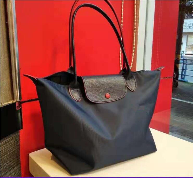 Women handbag Tote bag large capacity canvas single shoulder mommy bag nylon shopping bag female purses and handbags
Women handbag Tote bag large capacity canvas single shoulder mommy bag nylon shopping bag female purses and handbags