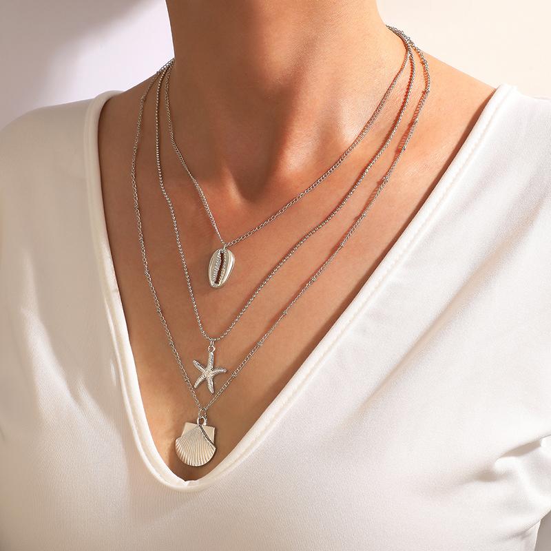 Chokers HuaTang Bohemian Fan Shape Pendant Necklace For Women Fashion Starfish Silver Color Alloy Multilayer Sweater Chain Jewelry 7105
Chokers HuaTang Bohemian Fan Shape Pendant Necklace For Women Fashion Starfish Silver Color Alloy Multilayer Sweater Chain Jewelry 7105