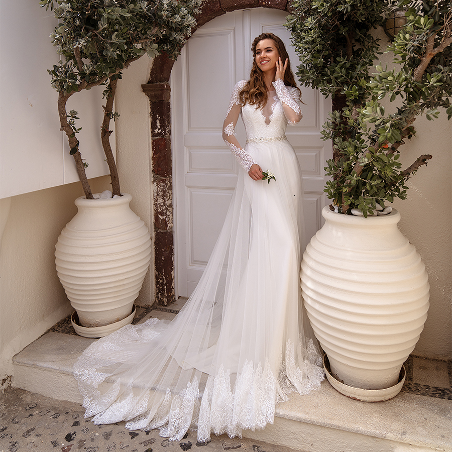 Robe De Mairee 2021 New Illusion Wedding Detachable Tulle Skirt Elegant Long Sleeves Lace Bridal Gown Beading 9dqt, White
Robe De Mairee 2021 New Illusion Wedding Detachable Tulle Skirt Elegant Long Sleeves Lace Bridal Gown Beading 9dqt, White