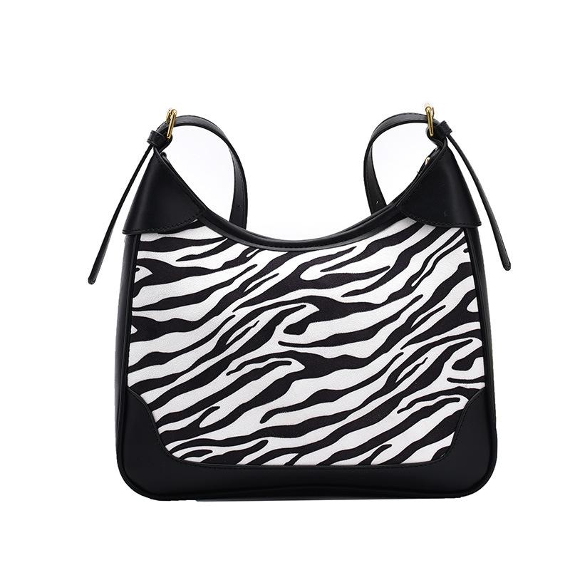 2021 new fashion women's bag net red armpit stick bag high-grade zebra pattern pure crowd design single shoulder, Black
2021 new fashion women's bag net red armpit stick bag high-grade zebra pattern pure crowd design single shoulder, Black
