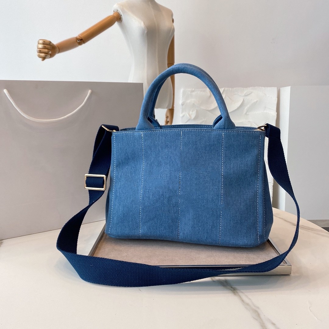 Summer retro Denim Blue Cross Body bag Dark Navy canvas wide shoulder straps unisex messenger Bags Classic black printing casual style Purse 28*20cm
Summer retro Denim Blue Cross Body bag Dark Navy canvas wide shoulder straps unisex messenger Bags Classic black printing casual style Purse 28*20cm