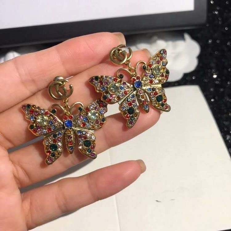 Brass butterfly knot color diamond 2021 double g new women's temperament fashion personality earrings, Golden
Brass butterfly knot color diamond 2021 double g new women's temperament fashion personality earrings, Golden