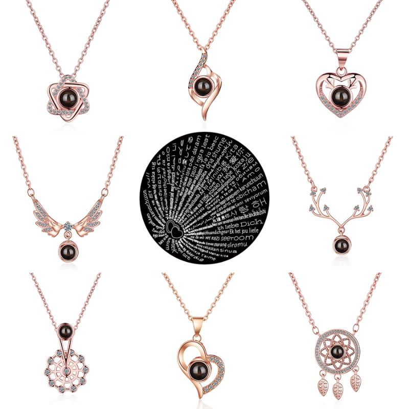 Pendant Necklaces Fanqieliu Rose Gold 100 Languages I Love You Micro Carving Projection Crystal Necklace For Women FQL20085
Pendant Necklaces Fanqieliu Rose Gold 100 Languages I Love You Micro Carving Projection Crystal Necklace For Women FQL20085