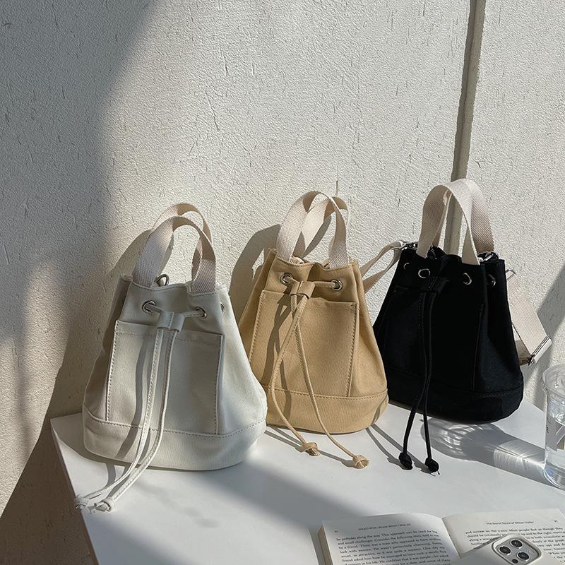 Casual Canvas Bucket Bag for Women Designer Drawsting Women Handbags Luxury Wide Strap Shoulder Crossbody Bags Lady Large Tote, Beige
Casual Canvas Bucket Bag for Women Designer Drawsting Women Handbags Luxury Wide Strap Shoulder Crossbody Bags Lady Large Tote, Beige