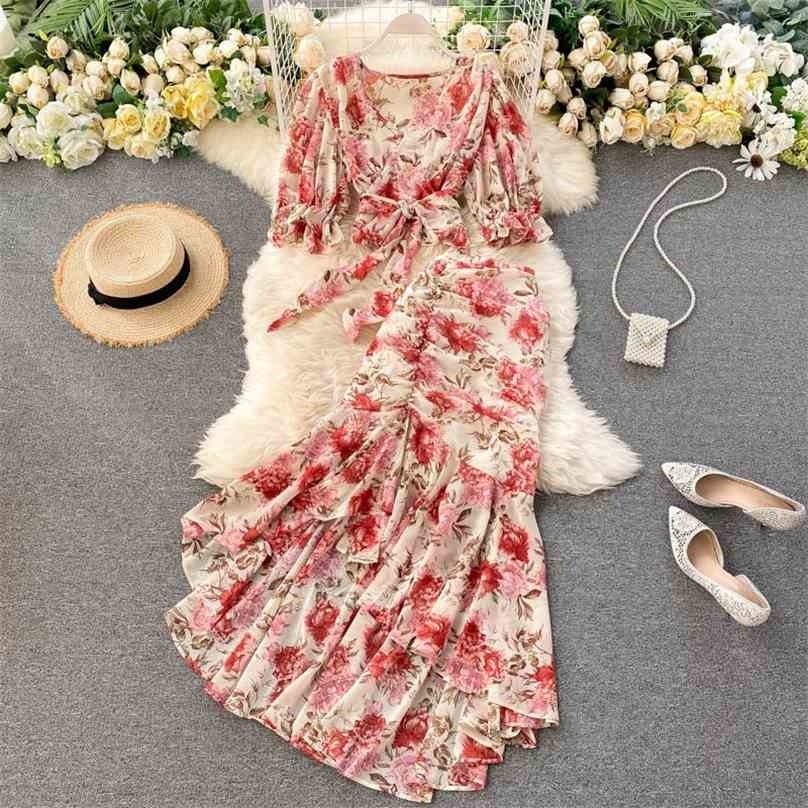 Women Chiffon 2 Piece Sets Summer V Neck Bandage Shirt Blouse Irregular Skirts Outfit Ladies Boho Floral Print Suits 210525
Women Chiffon 2 Piece Sets Summer V Neck Bandage Shirt Blouse Irregular Skirts Outfit Ladies Boho Floral Print Suits 210525