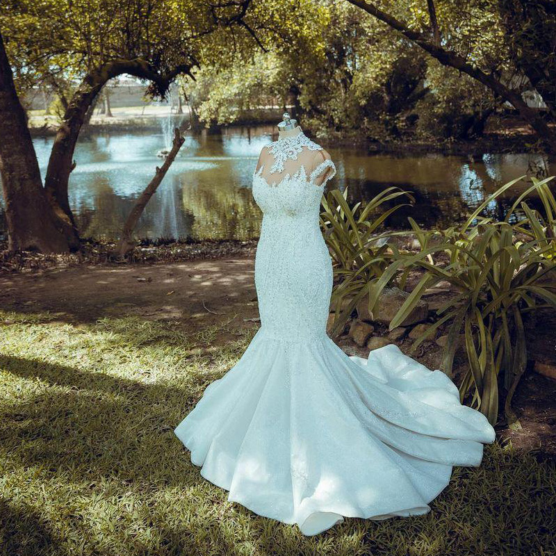 Shiny African High Neck Mermaid Wedding Dresses Appliques Lace Beads Sequins Cap Sleeve Long Plus Size Bridal Gowns Sheer Nude Neck Vestidos