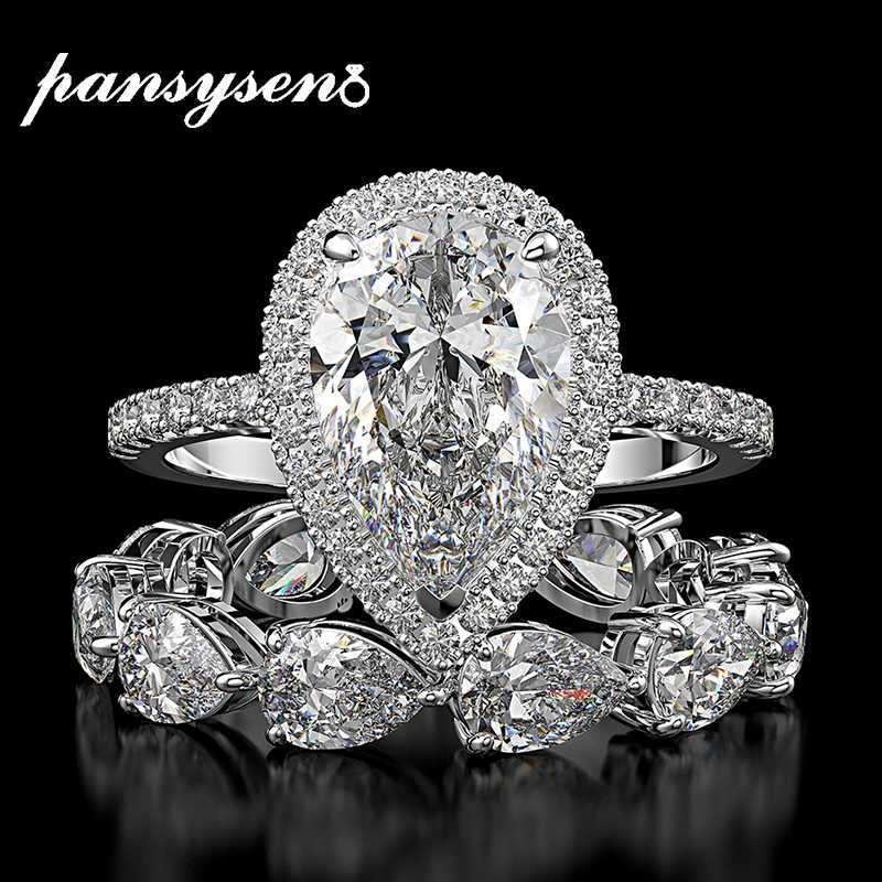 PANSYSEN Top Brand Redion Cut Created Moissanite Diamond Wedding Ring Sets Solid 925 Sterling Silver Jewelry Rings for Women
PANSYSEN Top Brand Redion Cut Created Moissanite Diamond Wedding Ring Sets Solid 925 Sterling Silver Jewelry Rings for Women