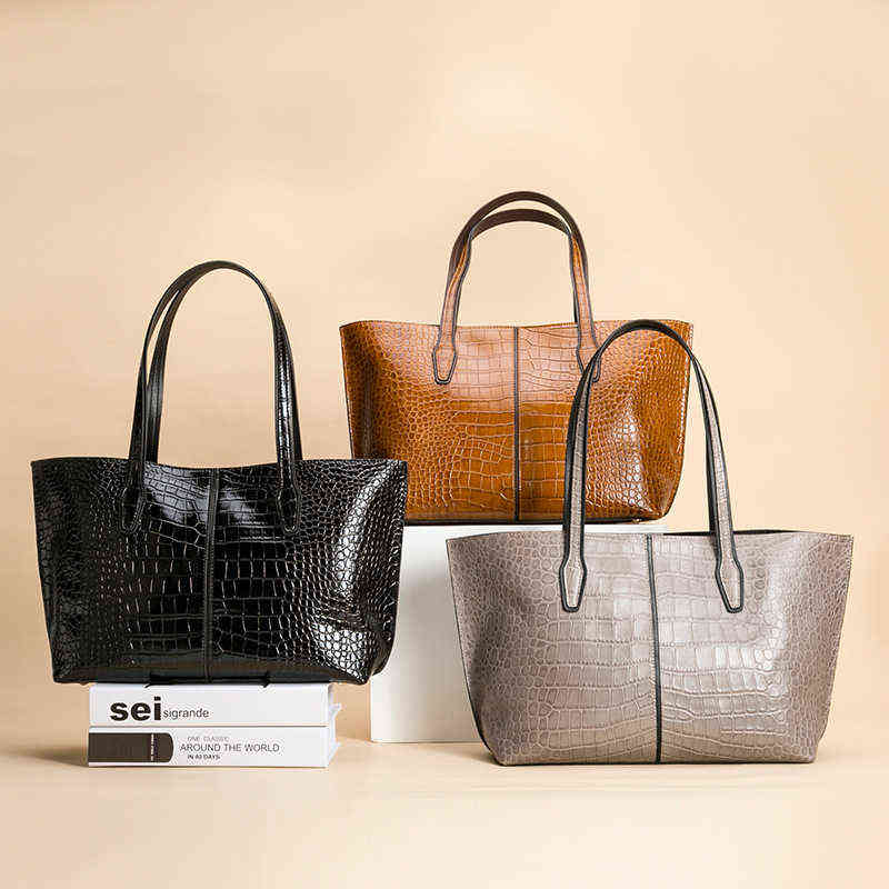 Trendy leather women's bag portable single shoulder bag grain cowhide Tote Bag
Trendy leather women's bag portable single shoulder bag grain cowhide Tote Bag