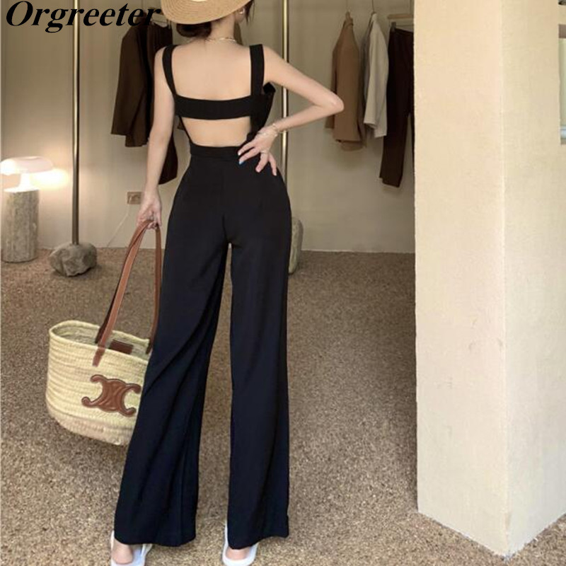 Sexy Sleeveless Backless White/Black Jumpsuits Rompers Women Summer High waist Wide leg Overalls Female Playsuits 210525
Sexy Sleeveless Backless White/Black Jumpsuits Rompers Women Summer High waist Wide leg Overalls Female Playsuits 210525