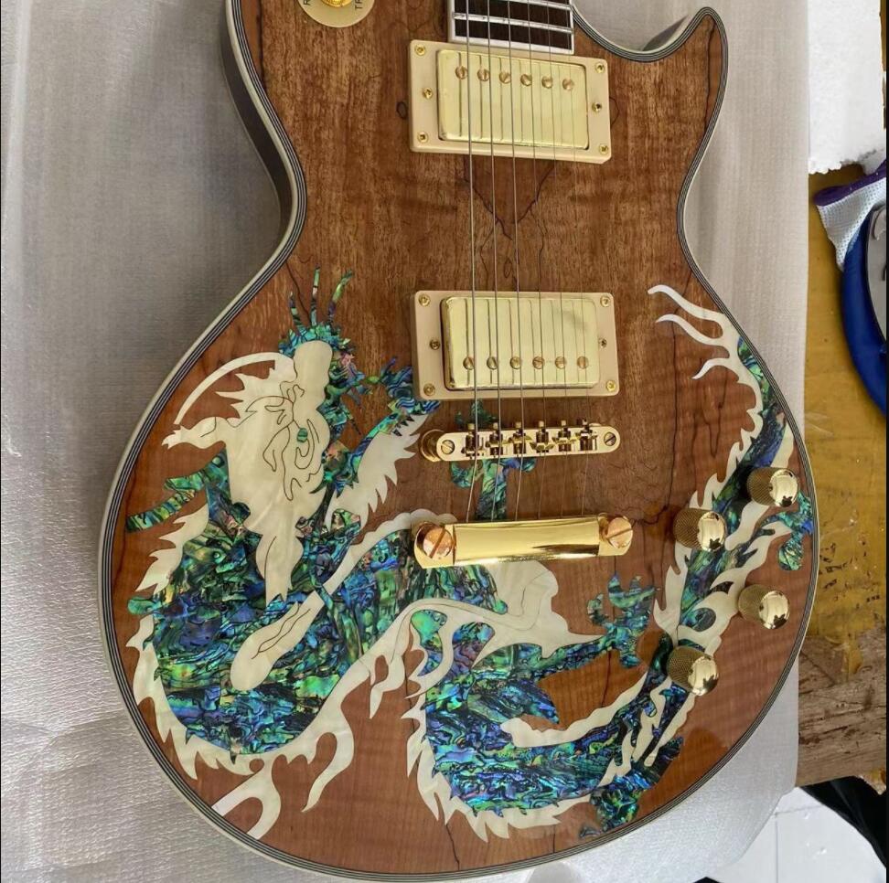 Custom Left Handed Electric Guitar, Mahogany Body&Neck, Dragon Abalone Inlays, Gold Hardware
Custom Left Handed Electric Guitar, Mahogany Body&Neck, Dragon Abalone Inlays, Gold Hardware