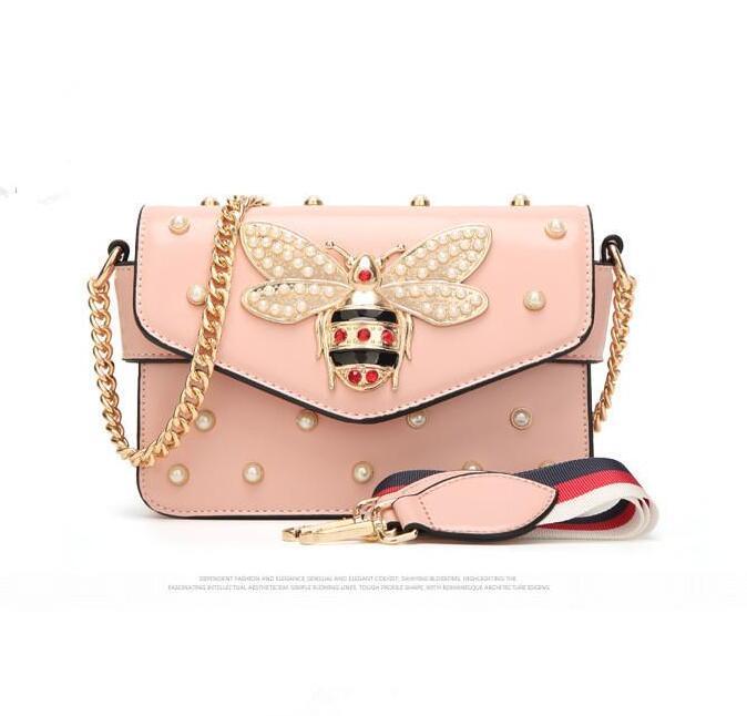 Factory wholesale women bag sweet and lovely Pearl chain bags street trends Diamonds handbag elegant atmosphere leather fashion handbags
Factory wholesale women bag sweet and lovely Pearl chain bags street trends Diamonds handbag elegant atmosphere leather fashion handbags